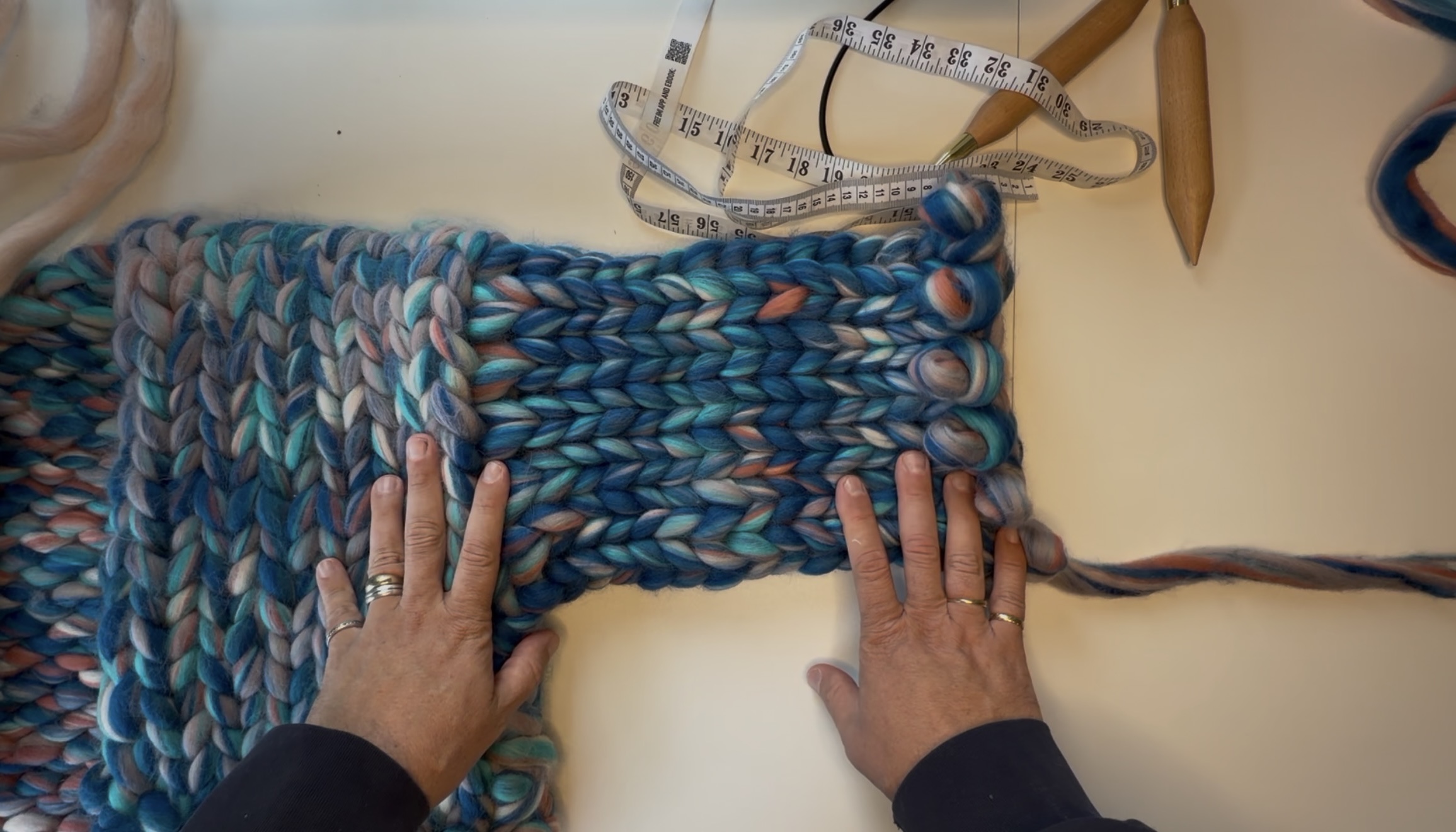 A chunky-knit balloon sleeve worked in the round on a Gigante cardigan