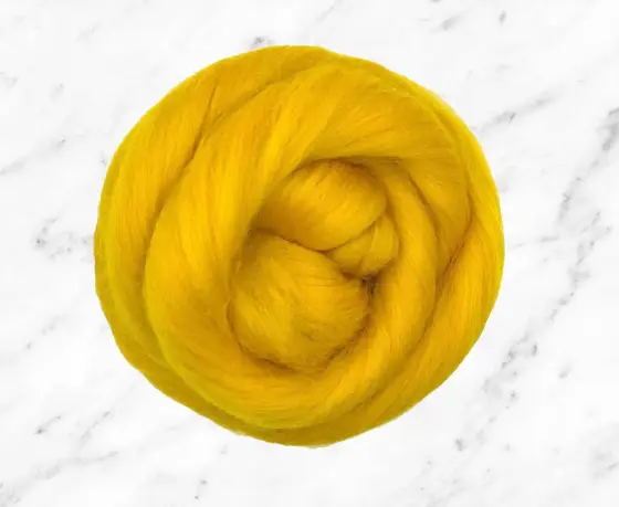 A coil of hand-prepped Corriedale roving